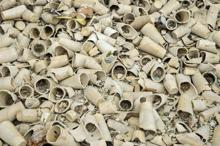 Ceramic cup for chemical analysis thrown in the trashの写真素材