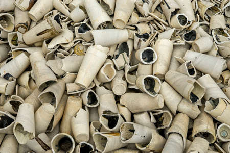 Ceramic cup for chemical analysis thrown in the trashの写真素材