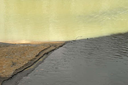 Two polluted rivers because of industrialization received a black and yellow green colors