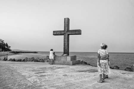 Pomorje, Bulgaria - July, 04.2012: Tourists on the path next to the beach on the sea coastのeditorial素材