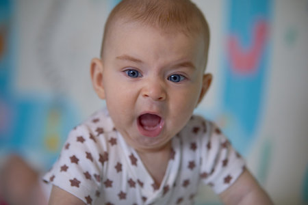 Portrait of a cute baby boy. Shallow depth of field.の写真素材