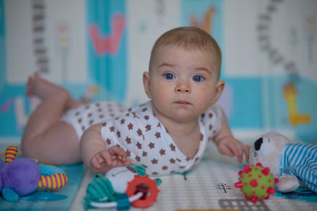 portrait of a cute little baby boy, indoor close-upの写真素材