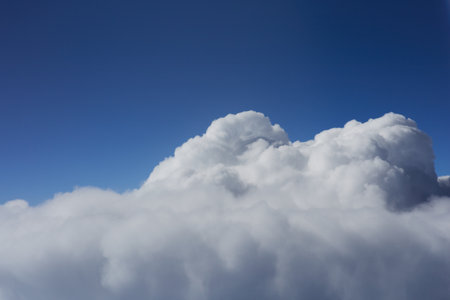 Cloudscape has been developing in gorgeous form. The vast blue sky and white clouds background.の写真素材