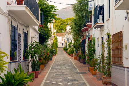 Typical street in the old town of Algarve, Portugalの写真素材