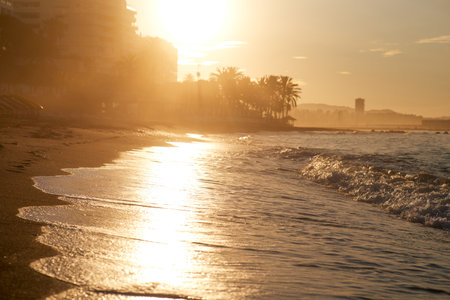 Sunset on the beach in Benidorm Costa Blanca Spainの写真素材