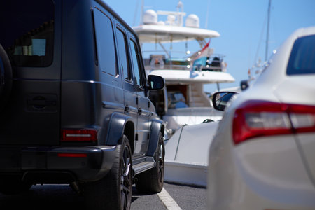 Cars parked in a row on the seashore. Selective focus.の写真素材