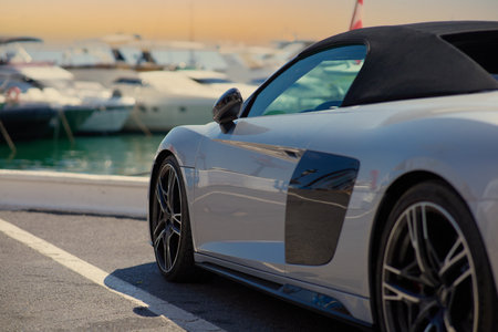 Luxury sports car parked in the port of Barcelona, Spainの写真素材