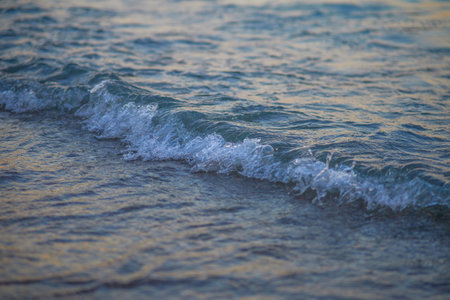 Soft wave of the sea on the sandy beach. Soft focus.の写真素材