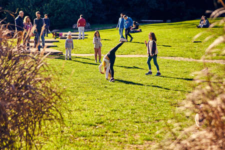 Lisbon, Portugal - January, 2018. Gulbenkian park and garden. People relax in the garden and enjoy sunny weather. Families came to the park on holiday for the weekend and to make picnic in the gardenのeditorial素材
