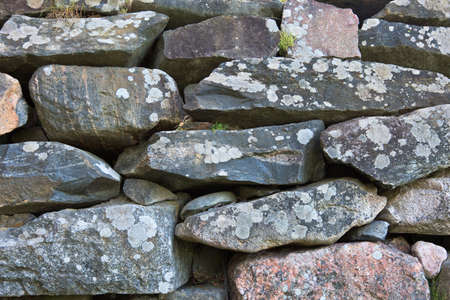 Fence made of large stonesの写真素材