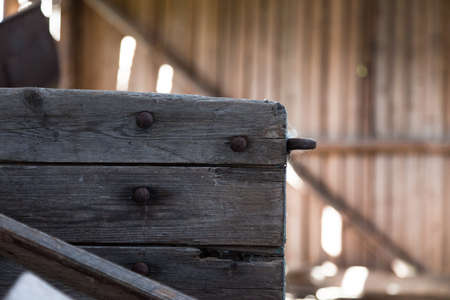 Corner of a wagon in barnの写真素材
