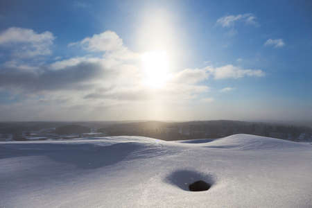 Frosty snow floating in the air on a highground