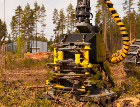 Logging machines blade on close upのeditorial素材