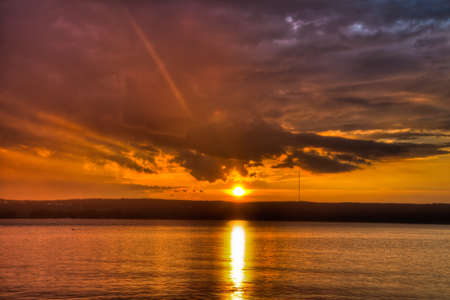 Sundown over an lake on late eveningの写真素材