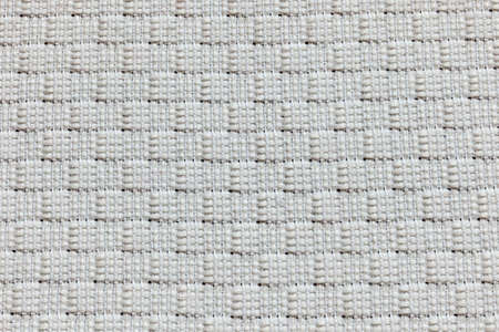 Furniture cover made of thick and thin white stringsの写真素材