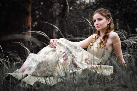 Portrait of romantic woman in fairy forestの写真素材