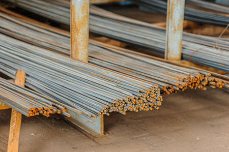 Metal profile square in packs at the warehouse of metal products.