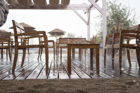Bad weather at the beach bar suddenly rained.の写真素材