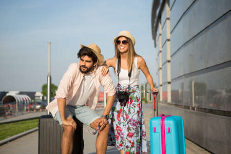 They missed the flight but that does not affect their mood.の写真素材