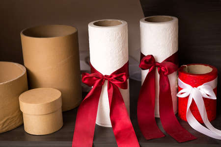 A few handmade boxes for flower arrangements, ready to be placed in the flowers. Some of them have...