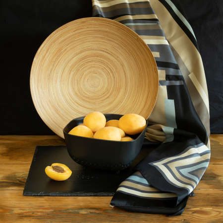 Washed apricots in a colander, still lifeの写真素材