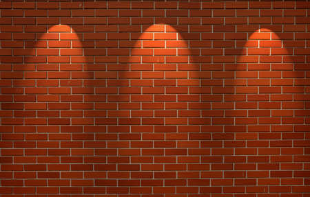 Fragment of the shined brick wall with three spot lightの写真素材