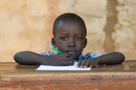 Very Proud Black African Boy Posing Under The Sun Writingの写真素材