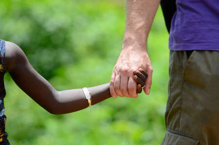 Peace on Earth Symbol - Different Cultures Holding Hands Sharing Lifestyle Experience
