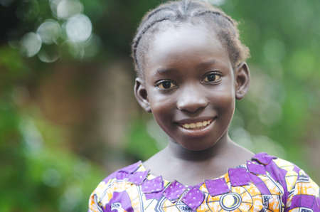 Beautiful African girl portrait outdoorsの写真素材