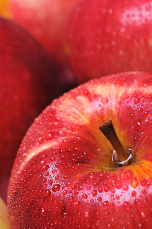 Close-up of red delicious apples with dropsの写真素材
