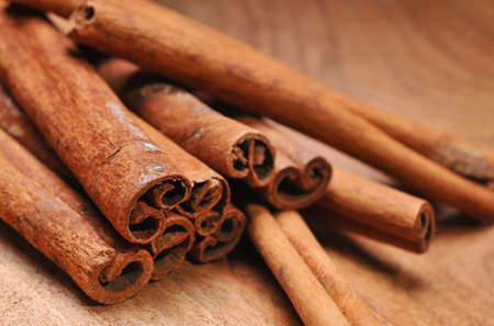 Close up of cinnamon stick on woody background
