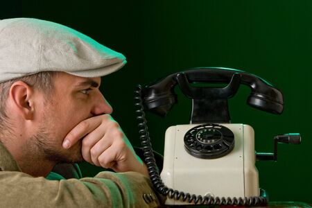 Waiting for a phone to ringの写真素材