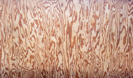 The surface of plywood for a long time in the open air under the sun and rain.の写真素材