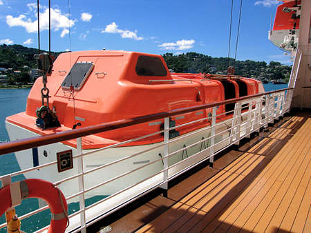 A view of a lifeboat from the deck of a cruise ship