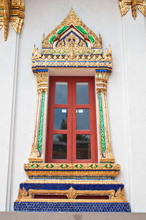 Golden windows of Temple in Bangkok Thailand.の写真素材