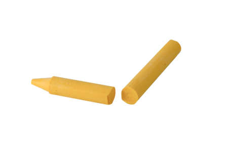 Yellow crayons on a white background 