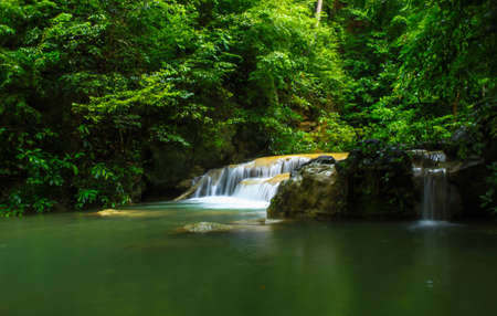 Waterfall and green stream in the forest Thailand