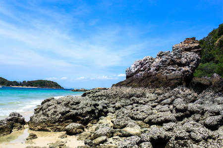 rock and sand beach in thailandの写真素材