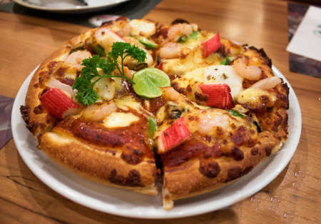 Delicious pizza with seafood