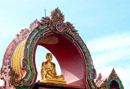 buddhist monk sitting in lotus pose at Bangkok Thailandの写真素材