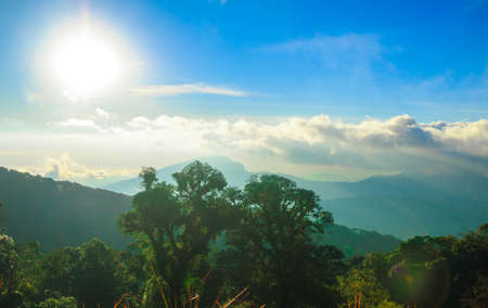 Majestic mountains landscape under morning sky with clouds.の写真素材