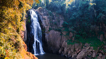 Waterfall and blue stream in the yellow forest Thailandの写真素材