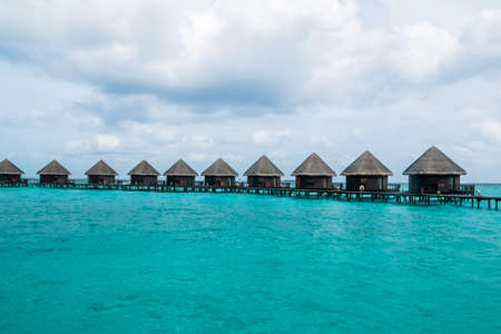 Beautiful tropical Maldives resort and island with beach and sea on blue sky for holiday vacationのeditorial素材