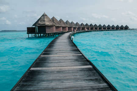 Beautiful tropical Maldives resort and island with beach and sea on blue sky for holiday vacationのeditorial素材