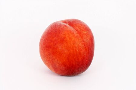 Single fresh ripe peach, isolatedの写真素材