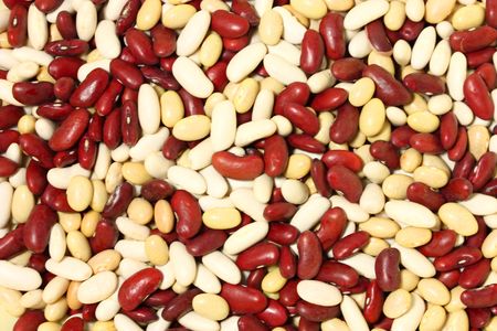 Heap of red, white and yellow beans の写真素材