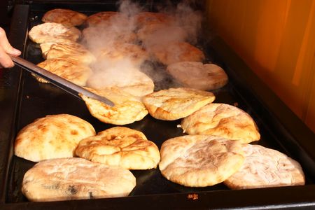 Preparing buns on the grill, ready for eatingの写真素材