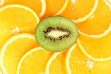 Kiwi and orange slices, juicy fruit backgroundの写真素材