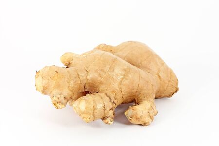 Ginger root closeup isolated on white backgroundの写真素材