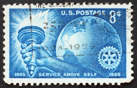 UNITED STATES OF AMERICA - CIRCA 1955: a stamp printed in the United States of America shows Torch,...